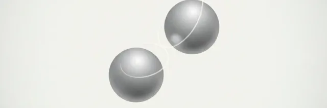 Two small silvery spherical magnets attracted together, viewed from close up, flat vector illustration with muted metallic tones.
